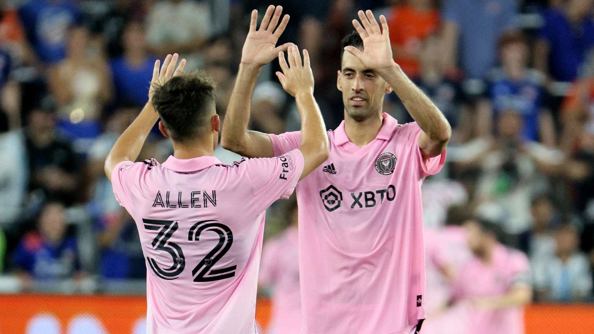 Sergio Busquets #5 and Noah Allen #32 of Inter Miami CF